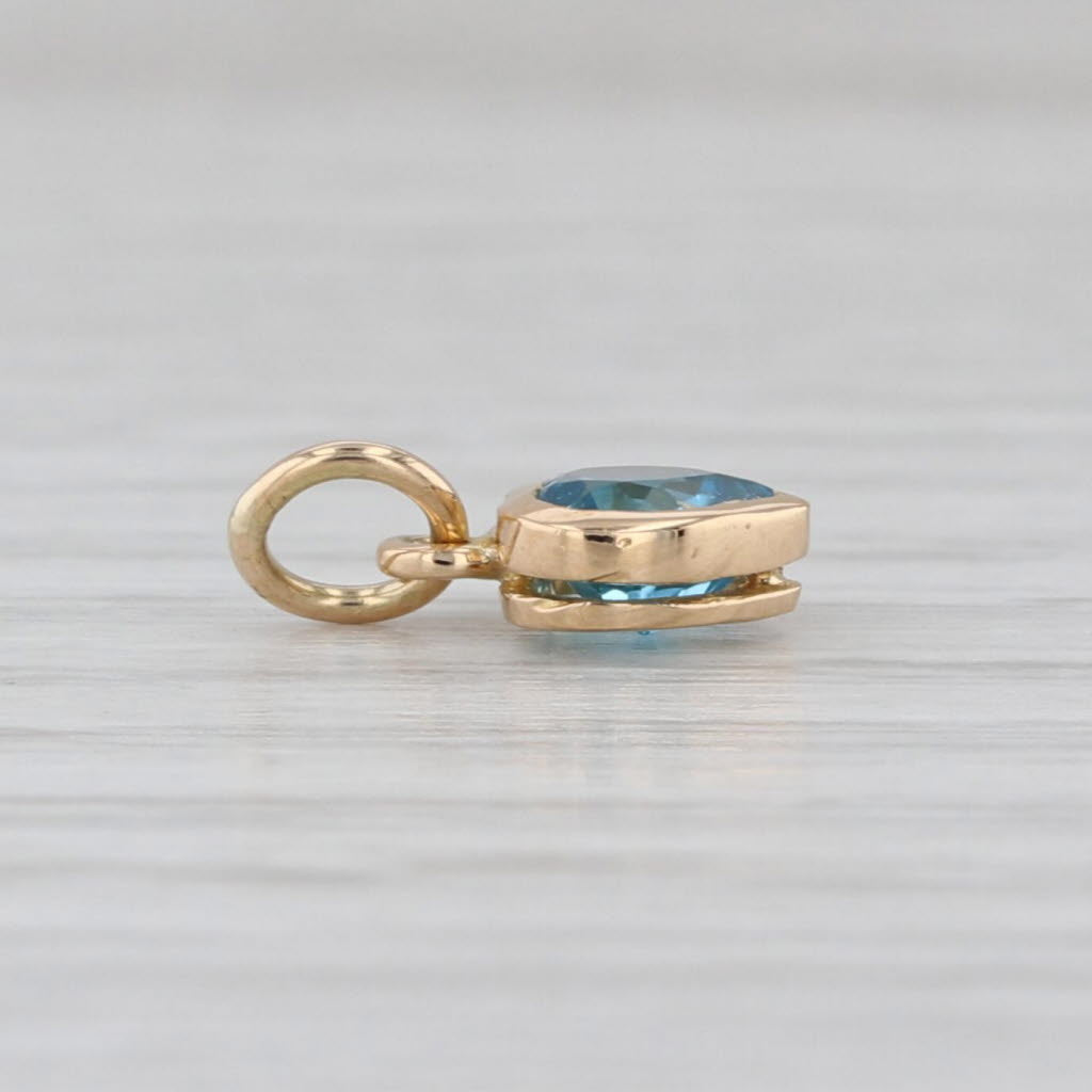 Small 0.50ct Blue Topaz Heart Charm 10k Yellow Gold December Birthstone Pendant