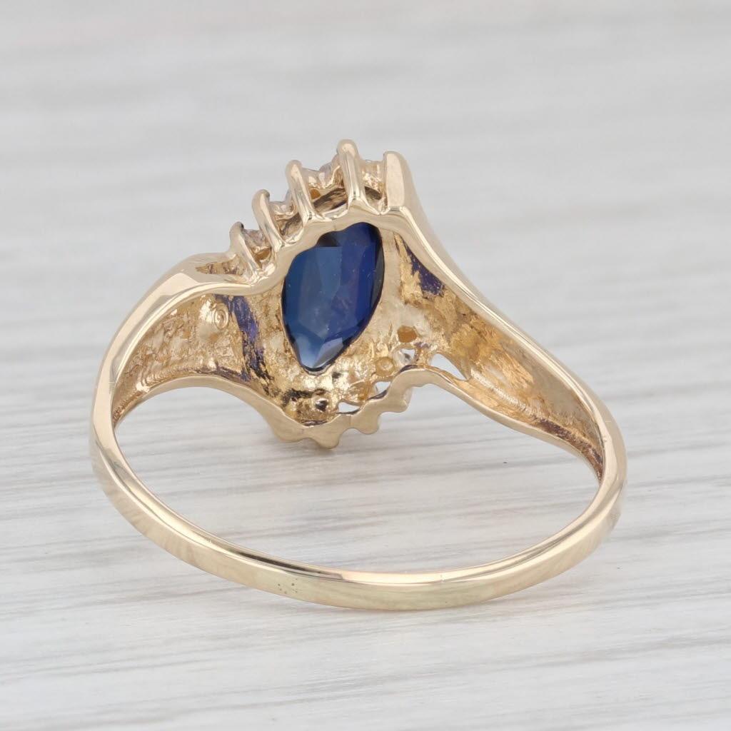 1.30ct Lab Created Blue Sapphire Bypass Ring 10k Gold Diamond Accents Size 9