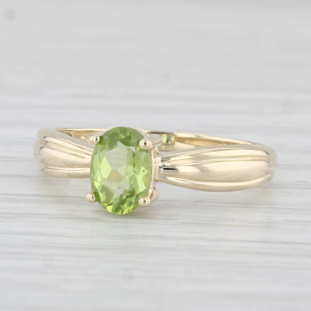 Light Gray 0.80ct Oval Peridot Solitaire Ring 10k Yellow Gold Size 7.25