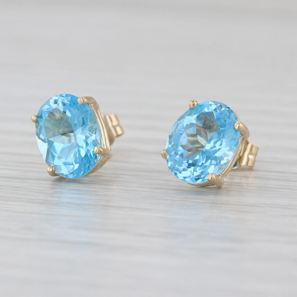 4.60ctw Oval Blue Topaz Stud Earrings 14k Yellow Gold Solitaire Studs