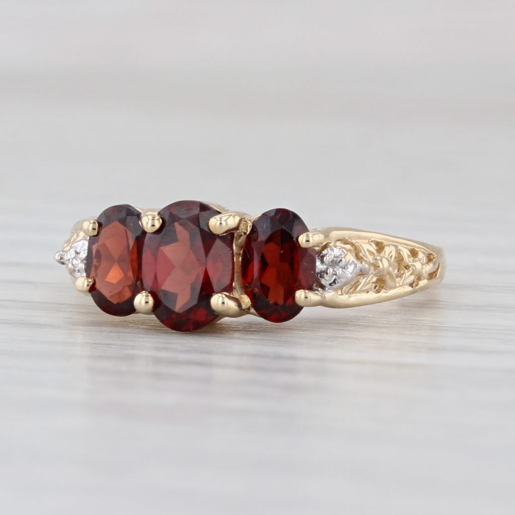 1.74ctw Garnet 3-Stone Diamond Ring 10k Yellow Gold Size 7