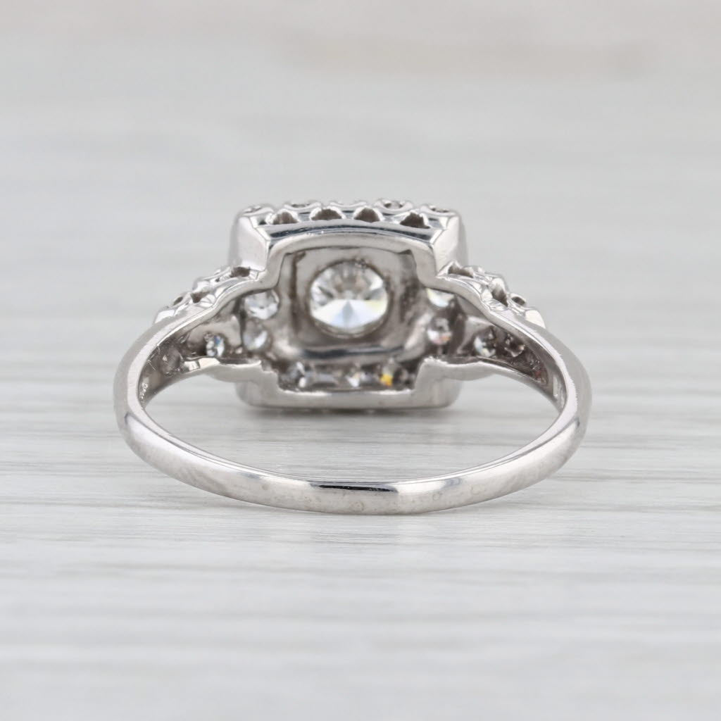 Vintage 0.70ctw Round Diamond Halo Engagement Ring Platinum Size 7.5