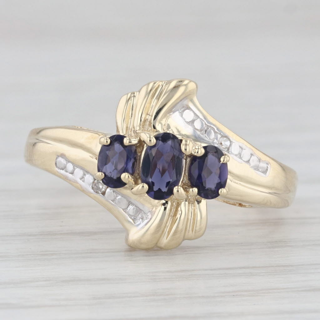 Light Gray 0.50ctw 3-Stone Iolite Bypass Ring 10k Yellow Gold Size 7.25