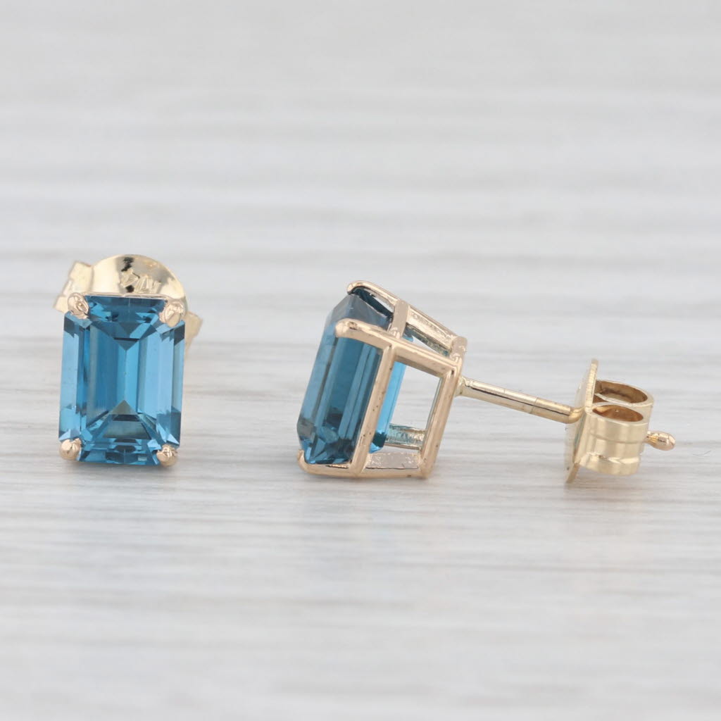 Light Gray 2.60ctw London Blue Topaz Stud Earrings 14k Yellow Gold Emerald Cut Solitaires