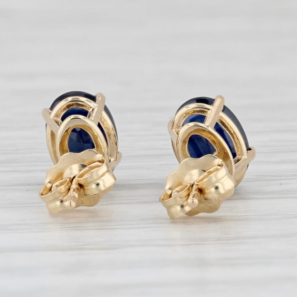 Light Gray 2ctw Blue Sapphire Stud Earrings 14k Yellow Gold Oval Solitaires