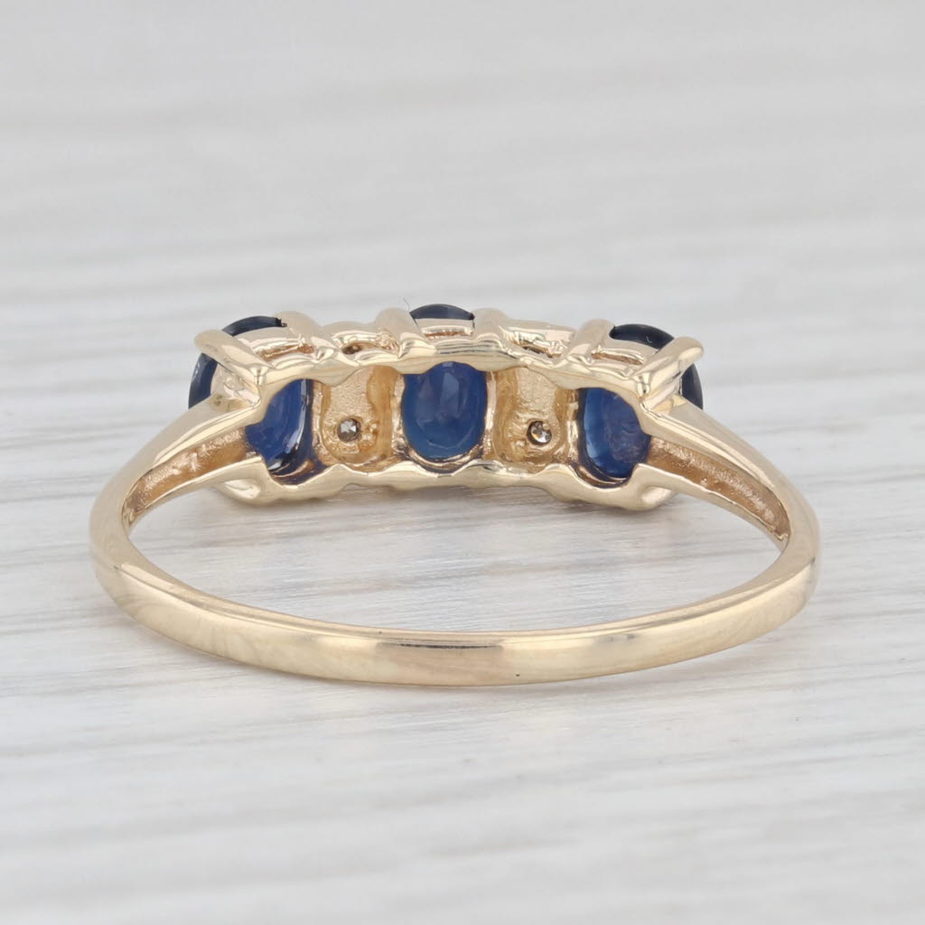 Light Gray 1.12ctw 3-Stone Oval Blue Sapphire Diamond Ring 14k Yellow Gold Size 9