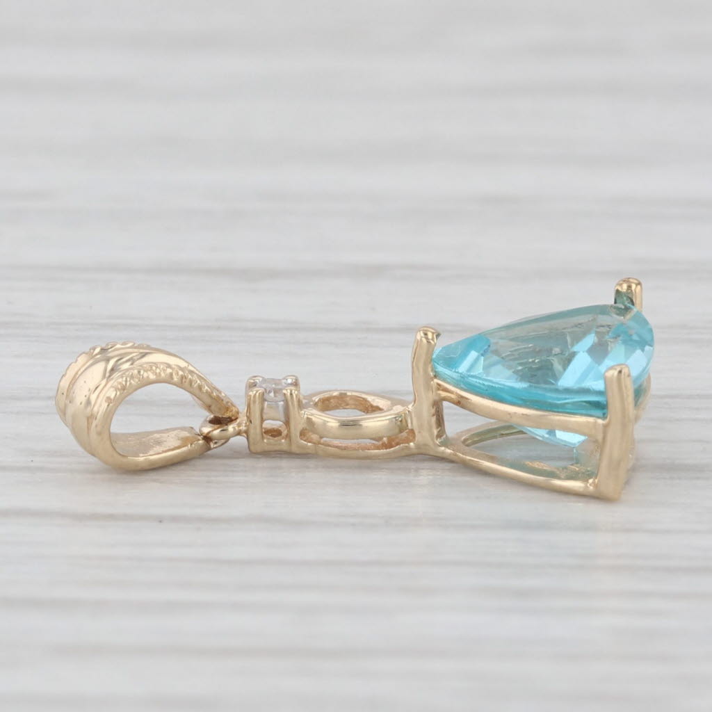 Light Gray 1.00ct Blue Apatite Diamond Drop Pendant 10K Yellow Gold Trillion Solitaire