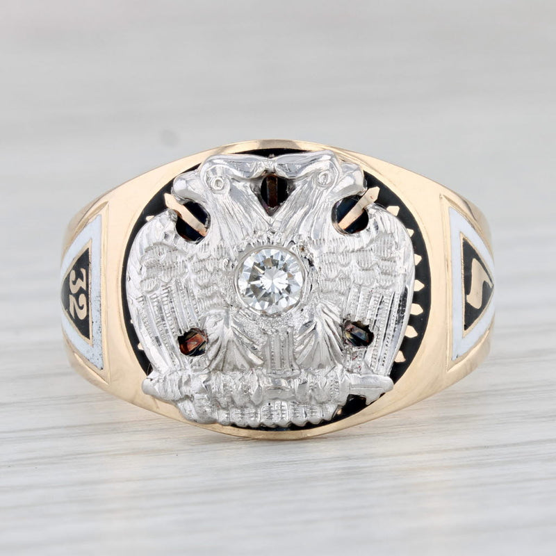 110a: A GENT'S 14K GOLD AND DIAMOND MASONIC RING