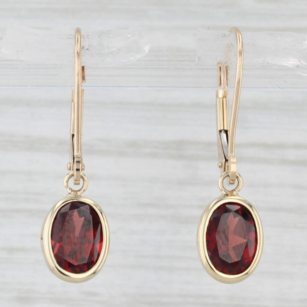 Light Gray 1.80ctw Oval Garnet Drop Earrings 14k Yellow Gold Lever Backs