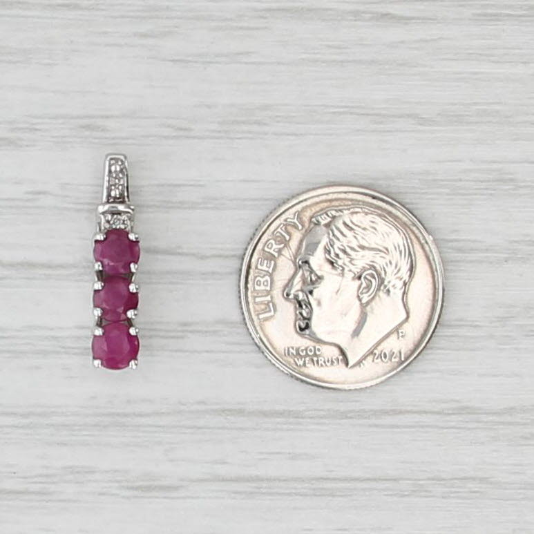1.15ctw Ruby 3-Stone Journey Pendant 10k White Gold Diamond Accents