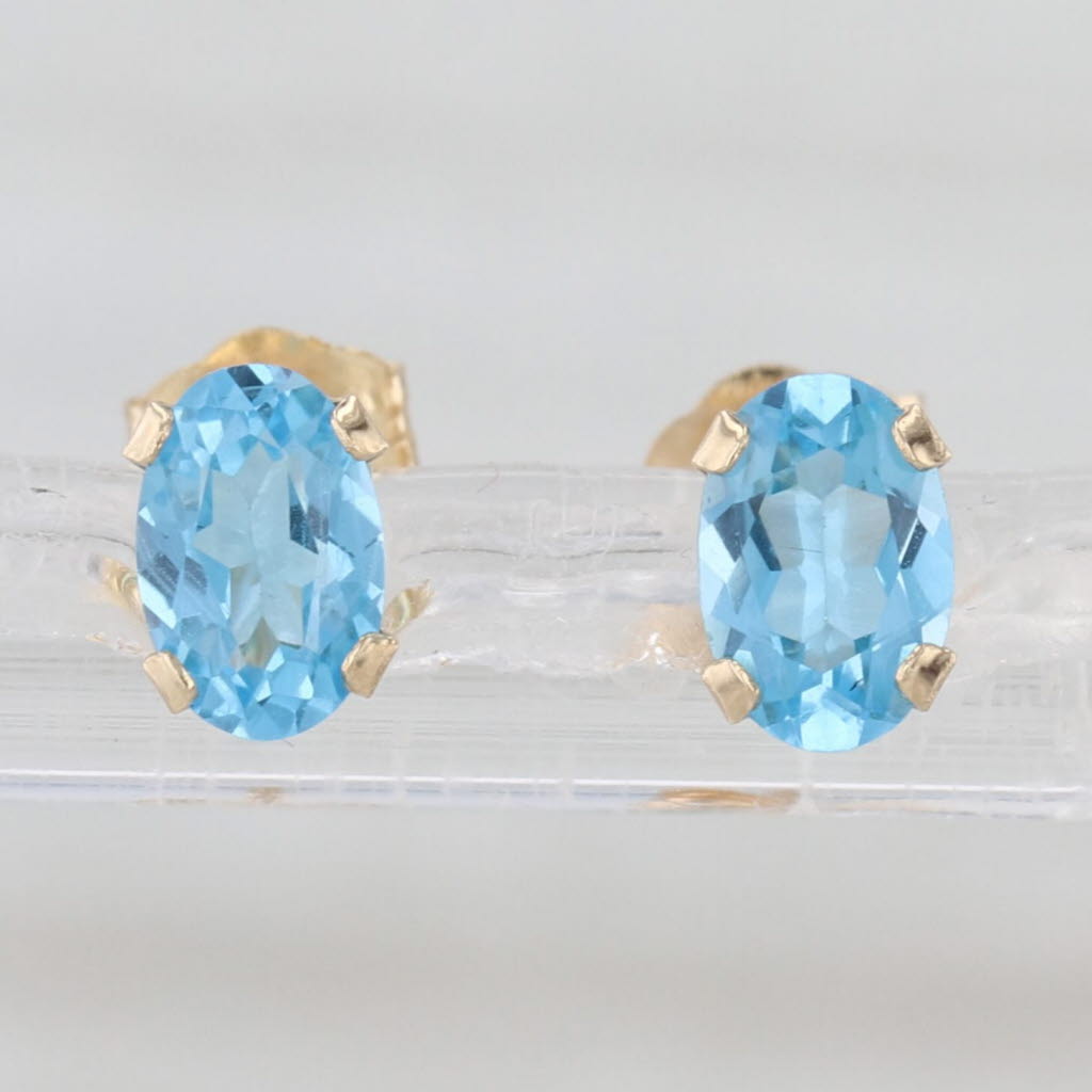 1ctw Oval Blue Topaz Solitaire Stud Earrings 14k Yellow Gold Studs