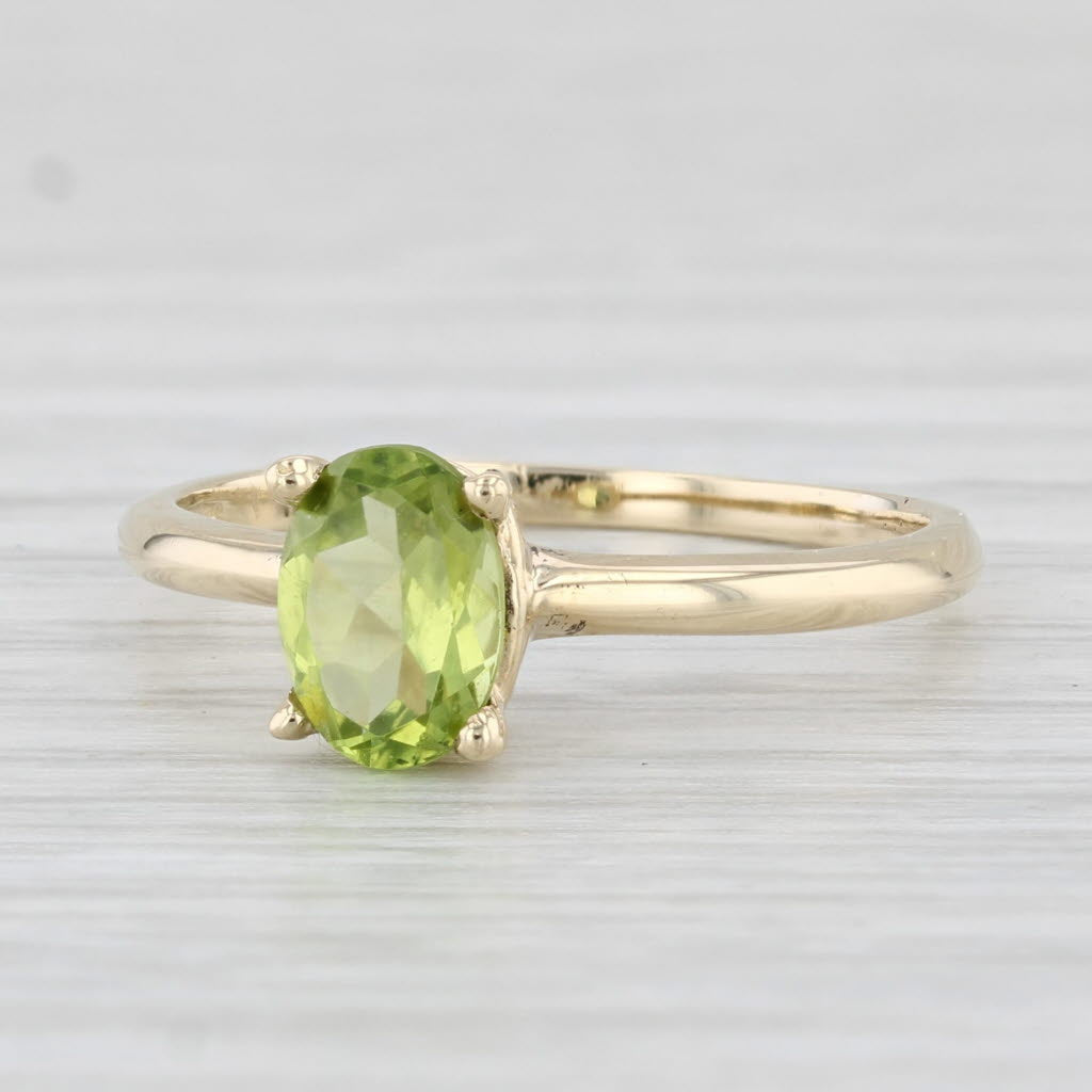 Light Gray 0.85ct Oval Peridot Solitaire Ring 10k Yellow Gold Size 6