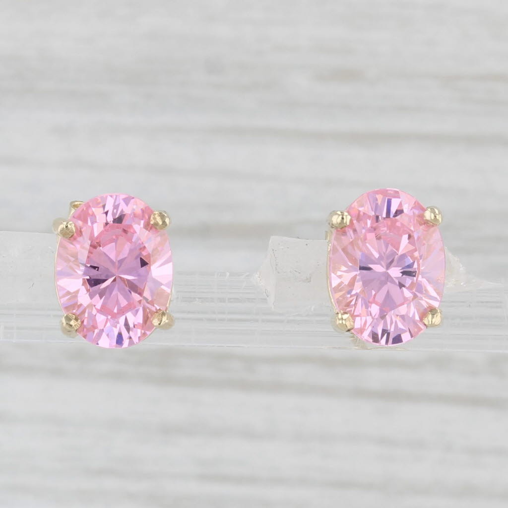 Light Gray 2.40ctw Oval Pink Ice Cubic Zirconia Stud Earrings 10k Yellow Gold