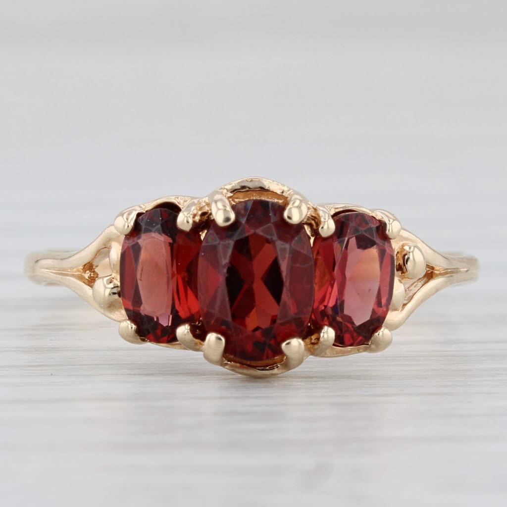 Light Gray 2.06ctw Oval 3-Stone Garnet Ring 10k Yellow Gold Size 9.5