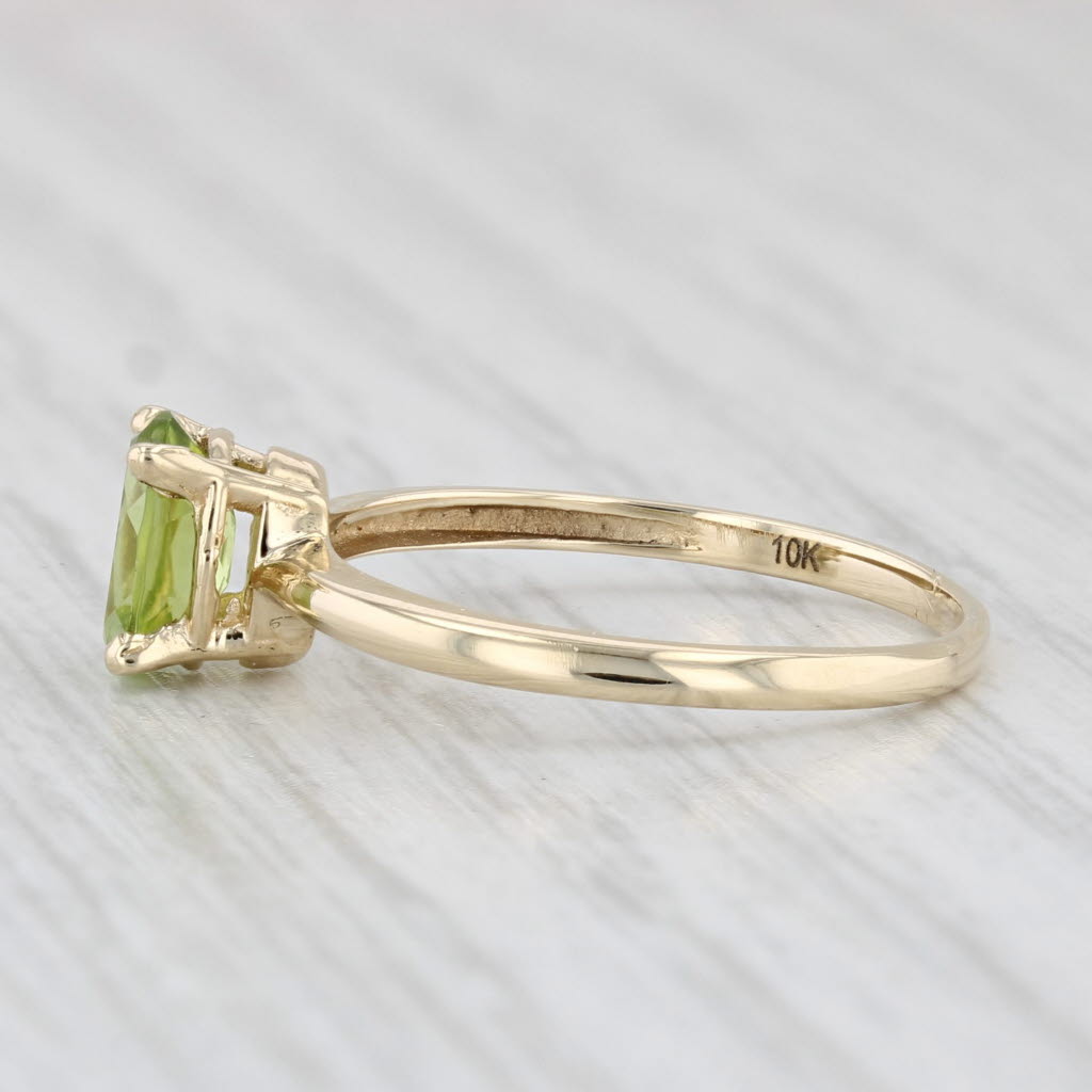 Light Gray 0.85ct Oval Peridot Solitaire Ring 10k Yellow Gold Size 6