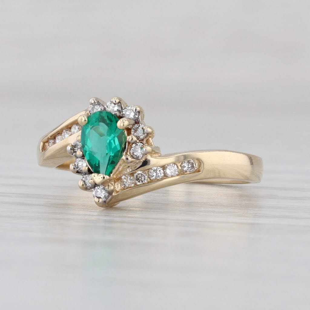 0.45ctw Lab Created Emerald Diamond Halo Bypass Ring 14k Yellow Gold