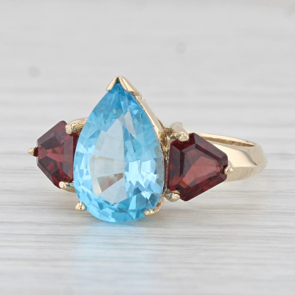 Light Gray 4.78ctw Pear Blue Topaz Garnet Ring 14k Yellow Gold Size 6