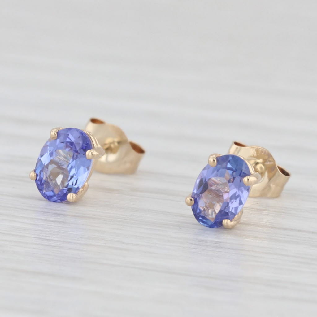 Light Gray 1ctw Oval Tanzanite Solitaire Stud Earrings 14k Yellow Gold