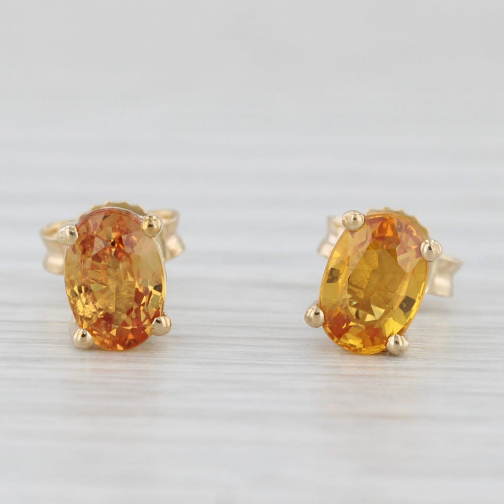 Light Gray 1.20ctw Oval Orange Citrine Solitaire Stud Earrings 10k Yellow Gold