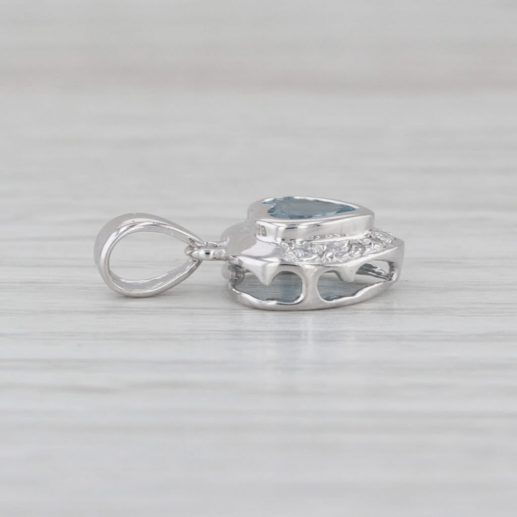 0.98ctw Blue Topaz Diamond Heart Pendant 14k White Gold