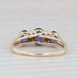 1.20ctw Lab Created Blue Sapphire 3-Stone Ring 10k Yellow Gold Size 7