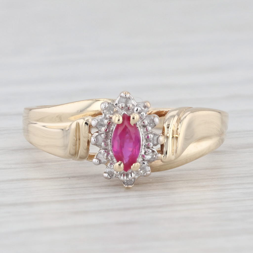 Light Gray 0.25ctw Marquise Ruby Diamond Halo Ring 10k Yellow Gold Size 6.25