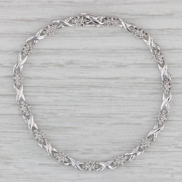 0.13ctw Diamond Cluster X Link Bracelet 10k White Gold 7" 5mm