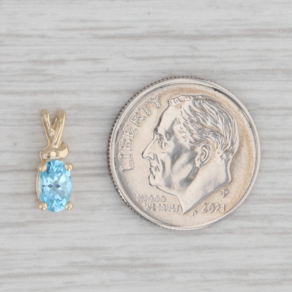 Gray 0.55ct Oval Blue Topaz Pendant 10k Yellow Gold Small Drop