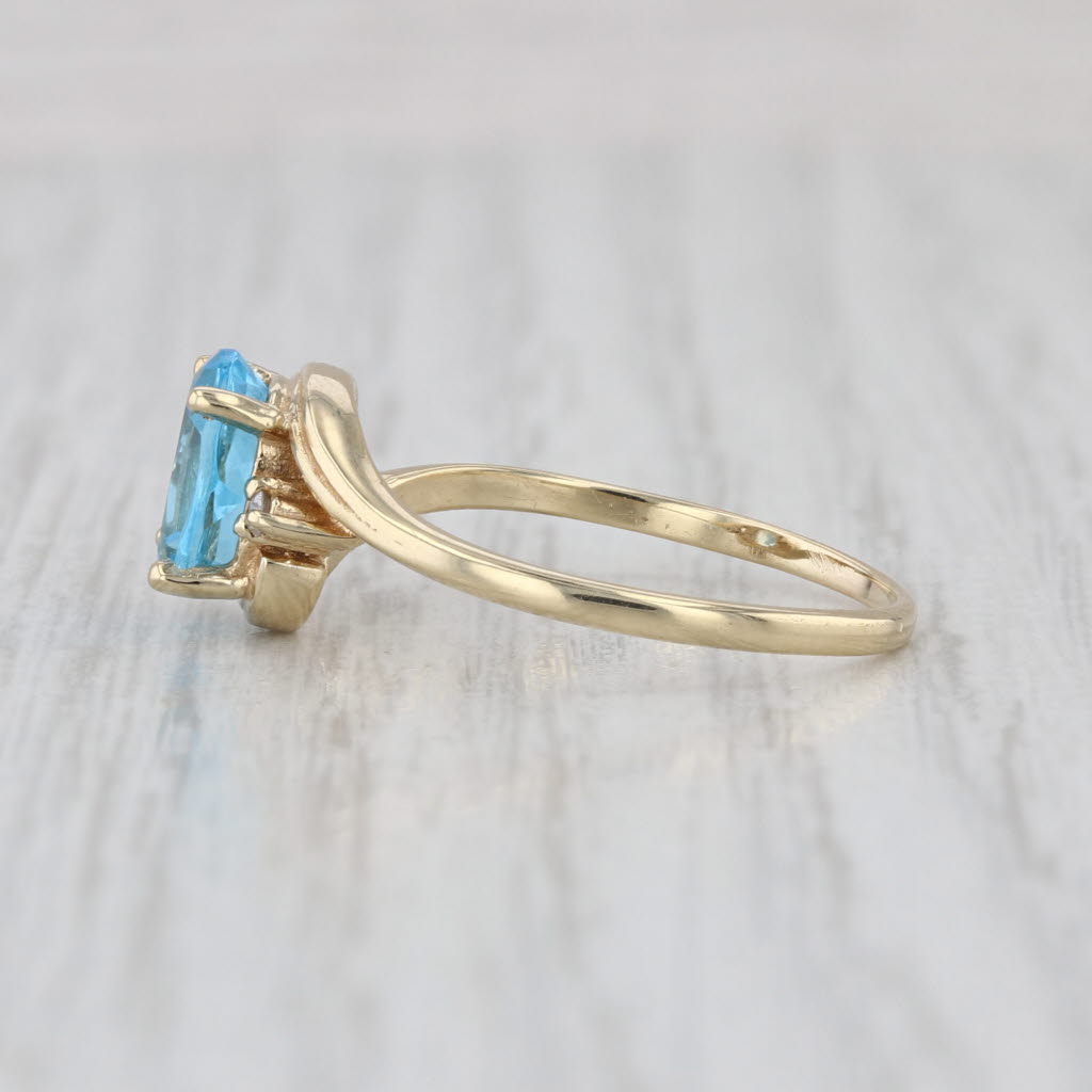 1.53ctw Oval Blue Topaz Diamond Bypass Ring 14k Yellow Gold Size 7.75