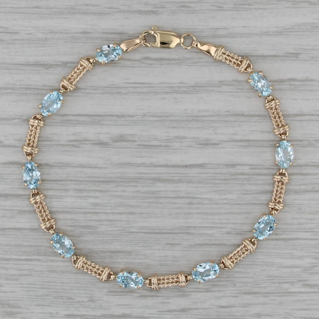 5.10ctw Blue Topaz Tennis Bracelet 10k Yellow Gold 7" 4.3mm