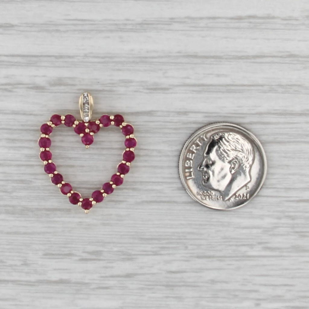 1.65ctw Ruby Diamond Open Heart Pendant 14k Yellow Gold