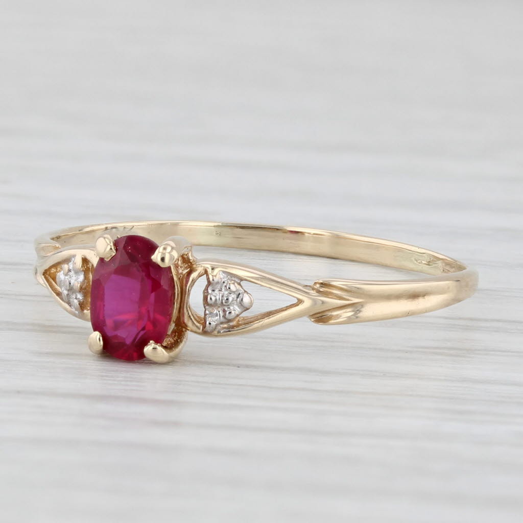 Light Gray 0.50ctw Oval Lab Created Ruby Ring 10k Yellow Gold Size 10.75