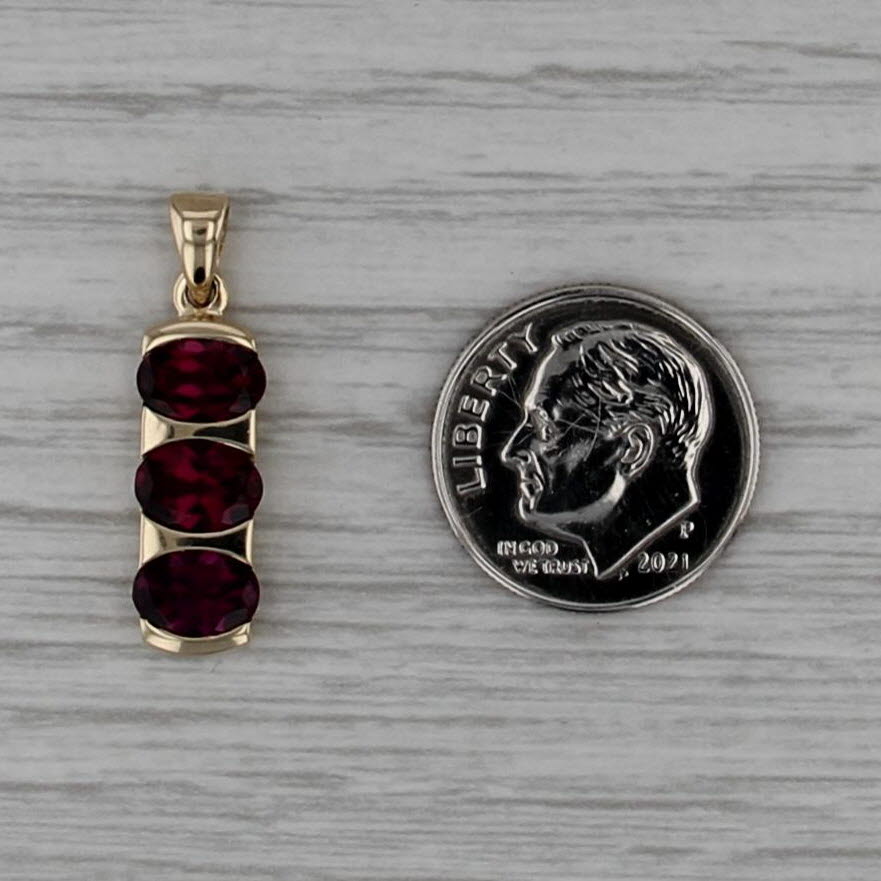 3ctw Rhodolite Garnet 3-Stone Pendant 10k Yellow Gold