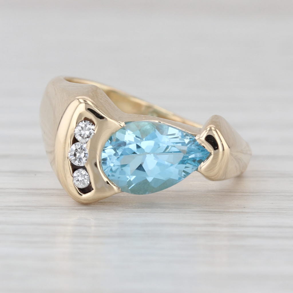 1.70ctw Pear Blue Topaz Diamond Ring 14k Yellow Gold Size 5.25