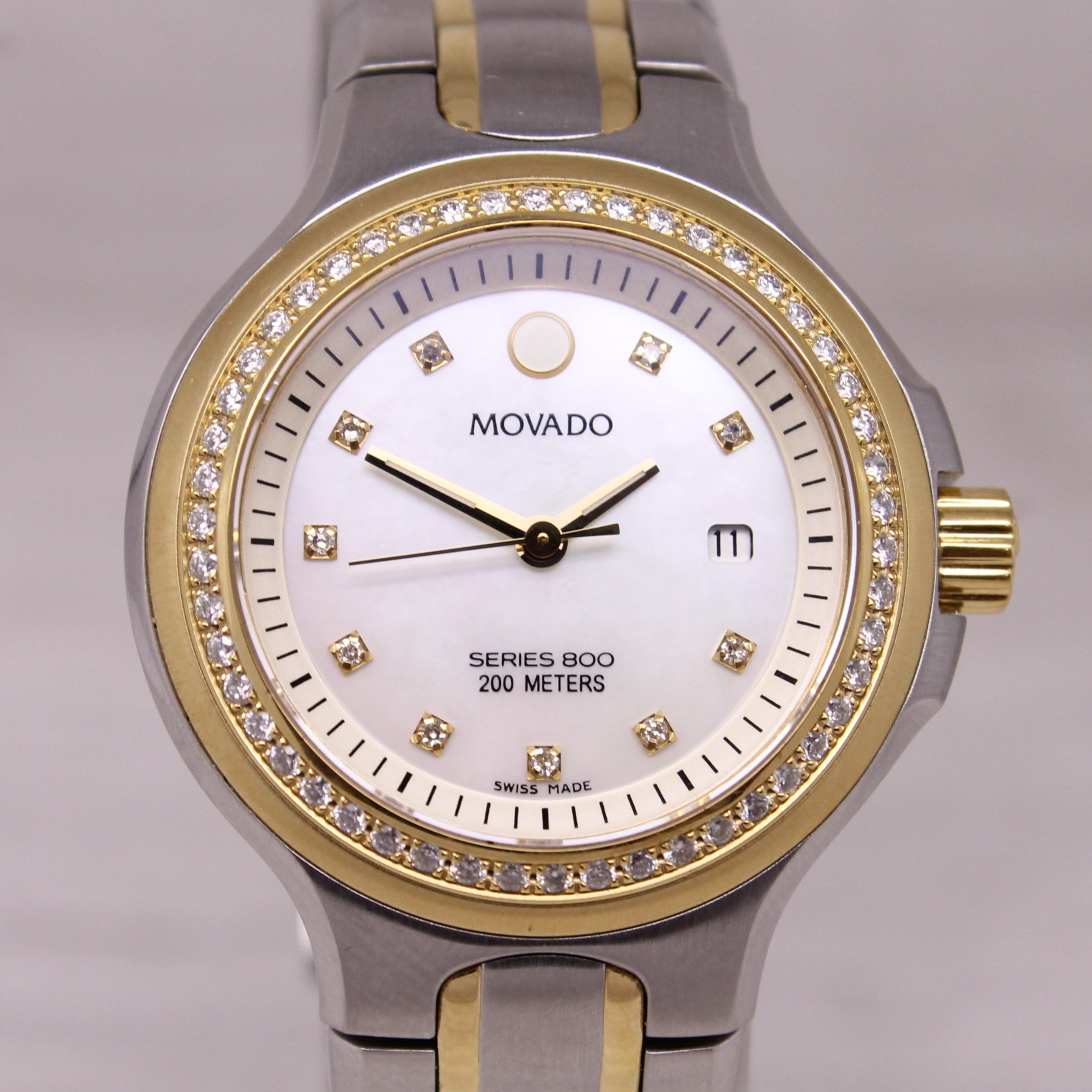 Movado Ladies Series 800 Diamond Bezel MOP 30mm Watch Two-Tone Steel Quartz Date