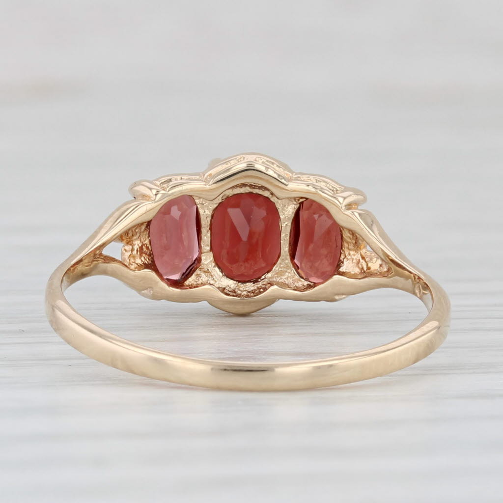 Light Gray 2.06ctw Oval 3-Stone Garnet Ring 10k Yellow Gold Size 9.5