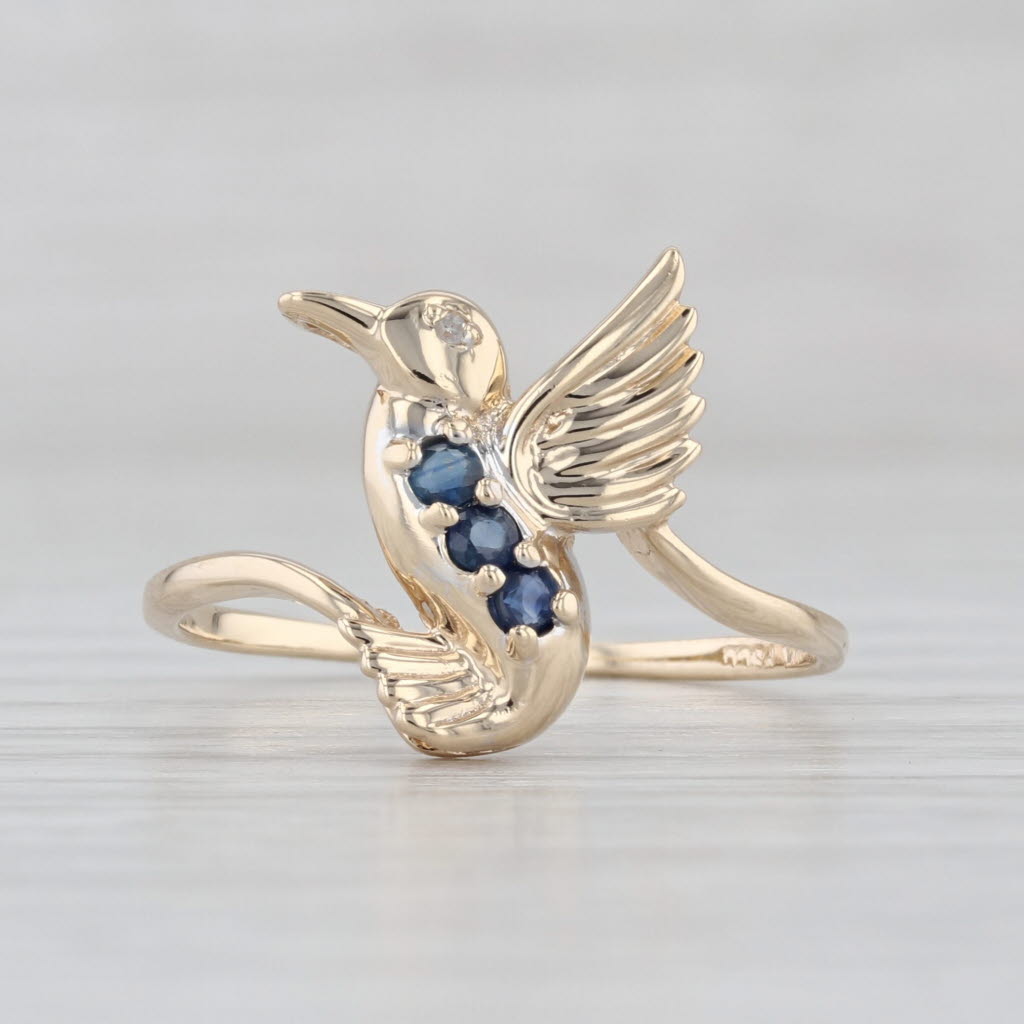 0.15ctw Blue Sapphire Hummingbird Ring 10k Yellow Gold Size 8 Bypass