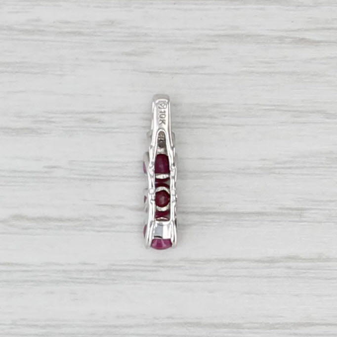 1.15ctw Ruby 3-Stone Journey Pendant 10k White Gold Diamond Accents