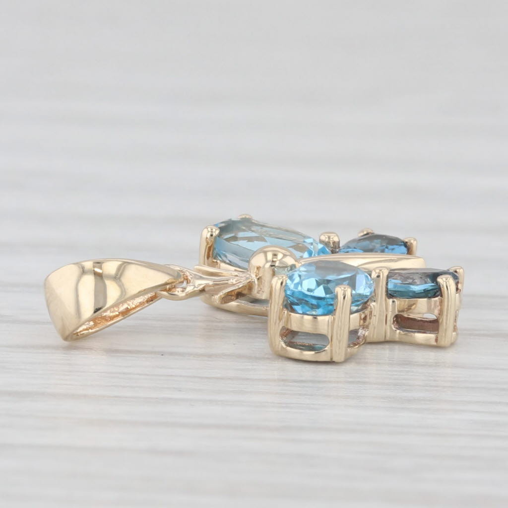 Light Gray 1.50ctw Blue Topaz Butterfly Pendant 10k Yellow Gold