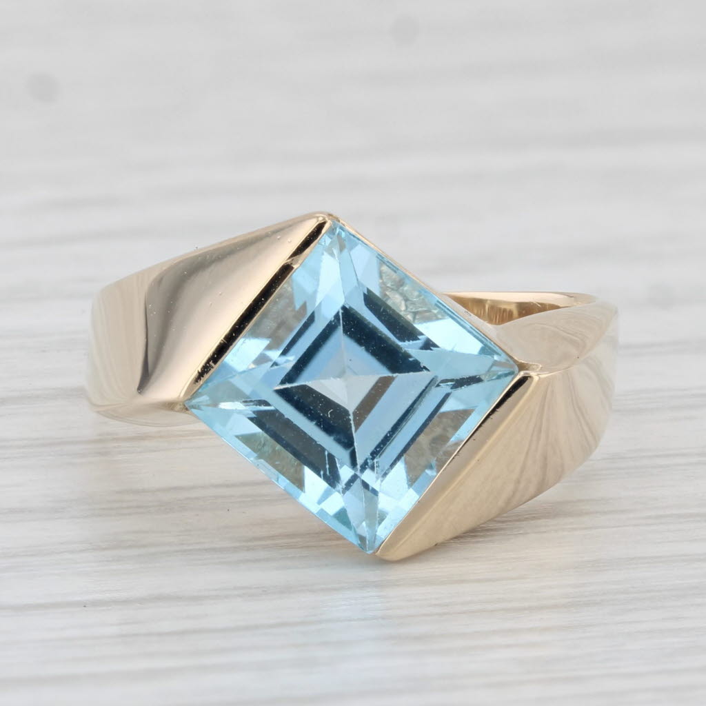 Light Gray 4ct Blue Topaz Ring 14k Yellow Gold Size 8.25 Bypass Princess Solitaire