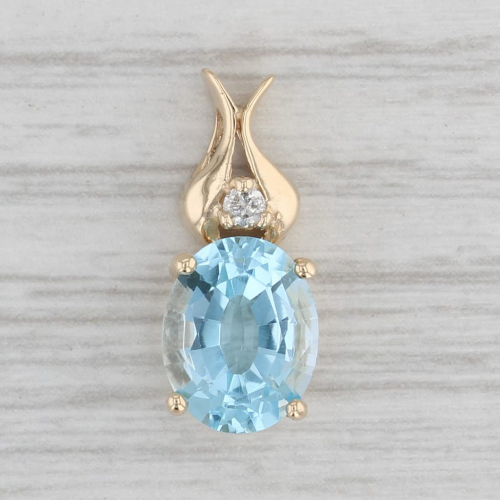 Gray 2.98ctw Oval Blue Topaz Diamond Pendant 14k Yellow Gold