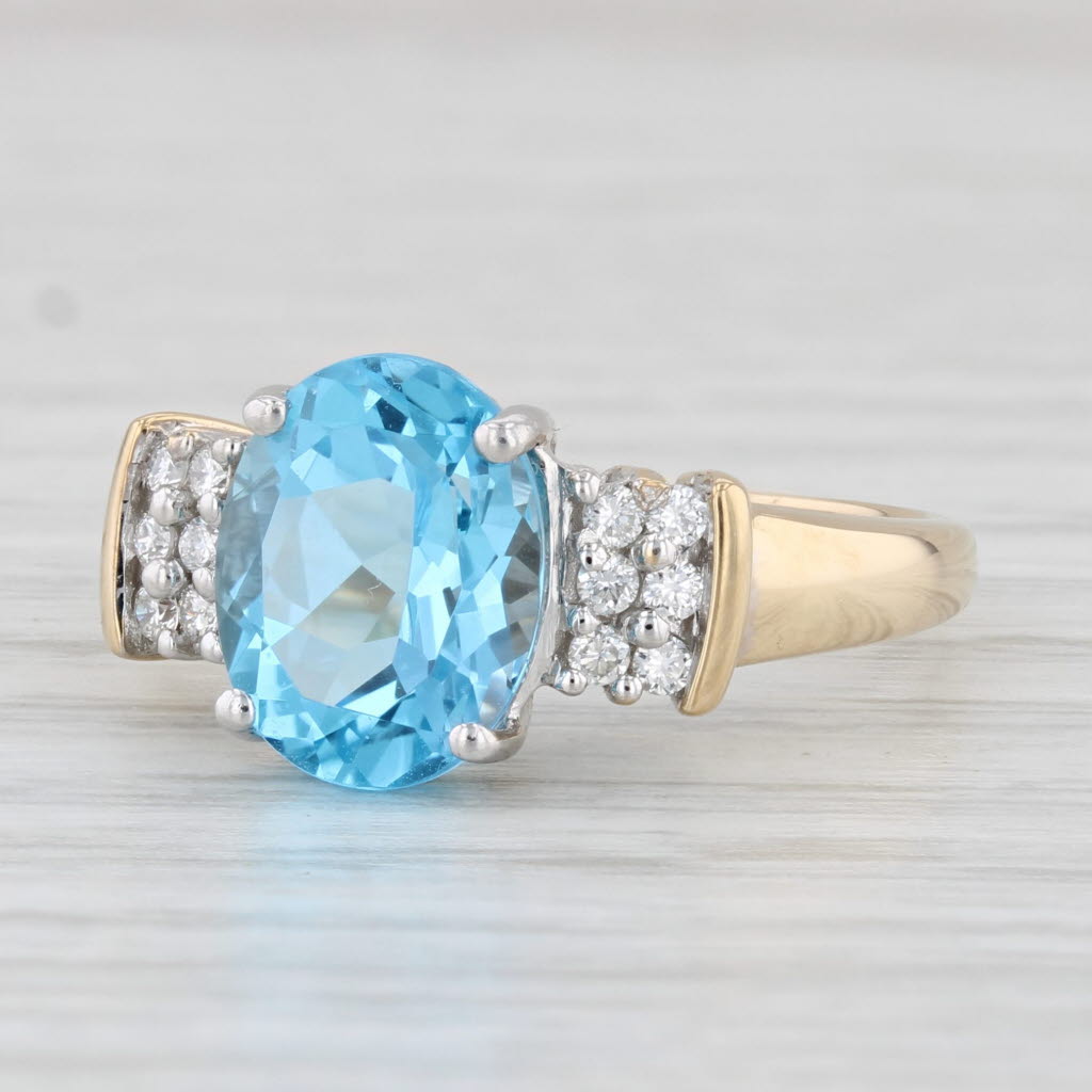 Light Gray 3.28ctw Oval Blue Topaz Diamond Ring 14k Yellow Gold Size 7