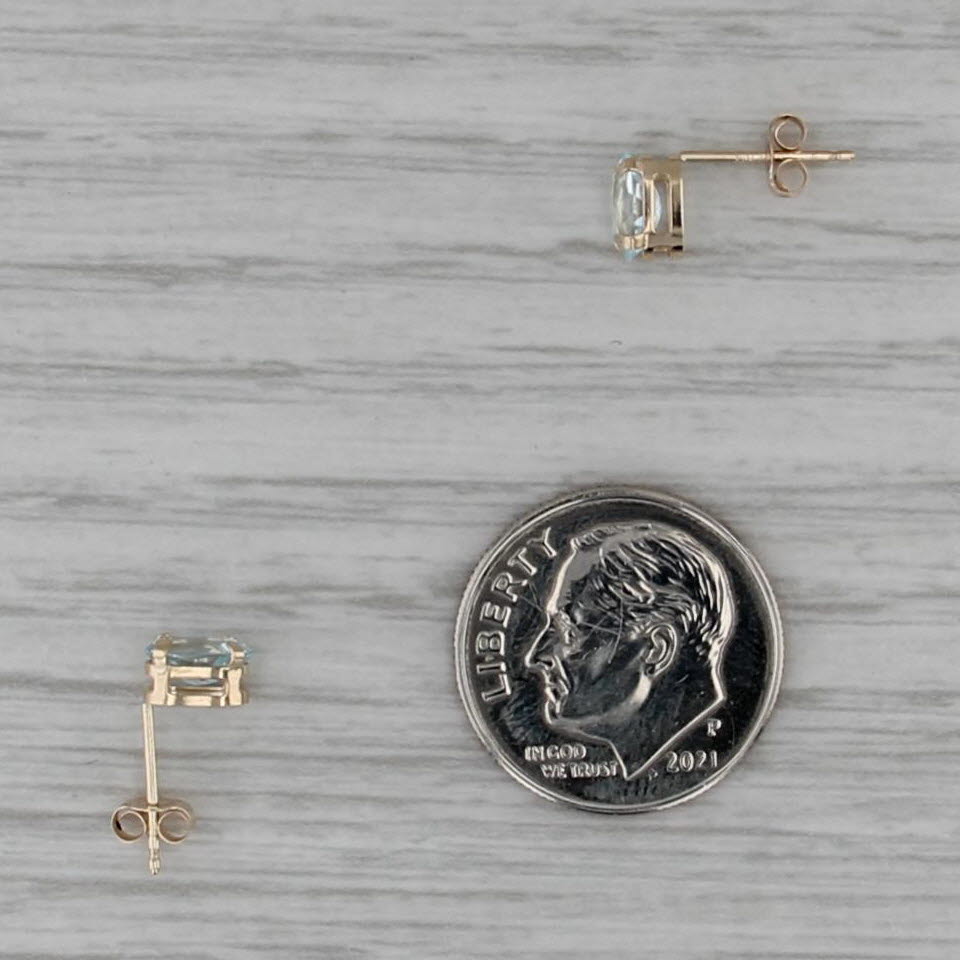 0.90ctw Oval Blue Topaz Stud Earrings 10k Yellow Gold Solitaire Studs