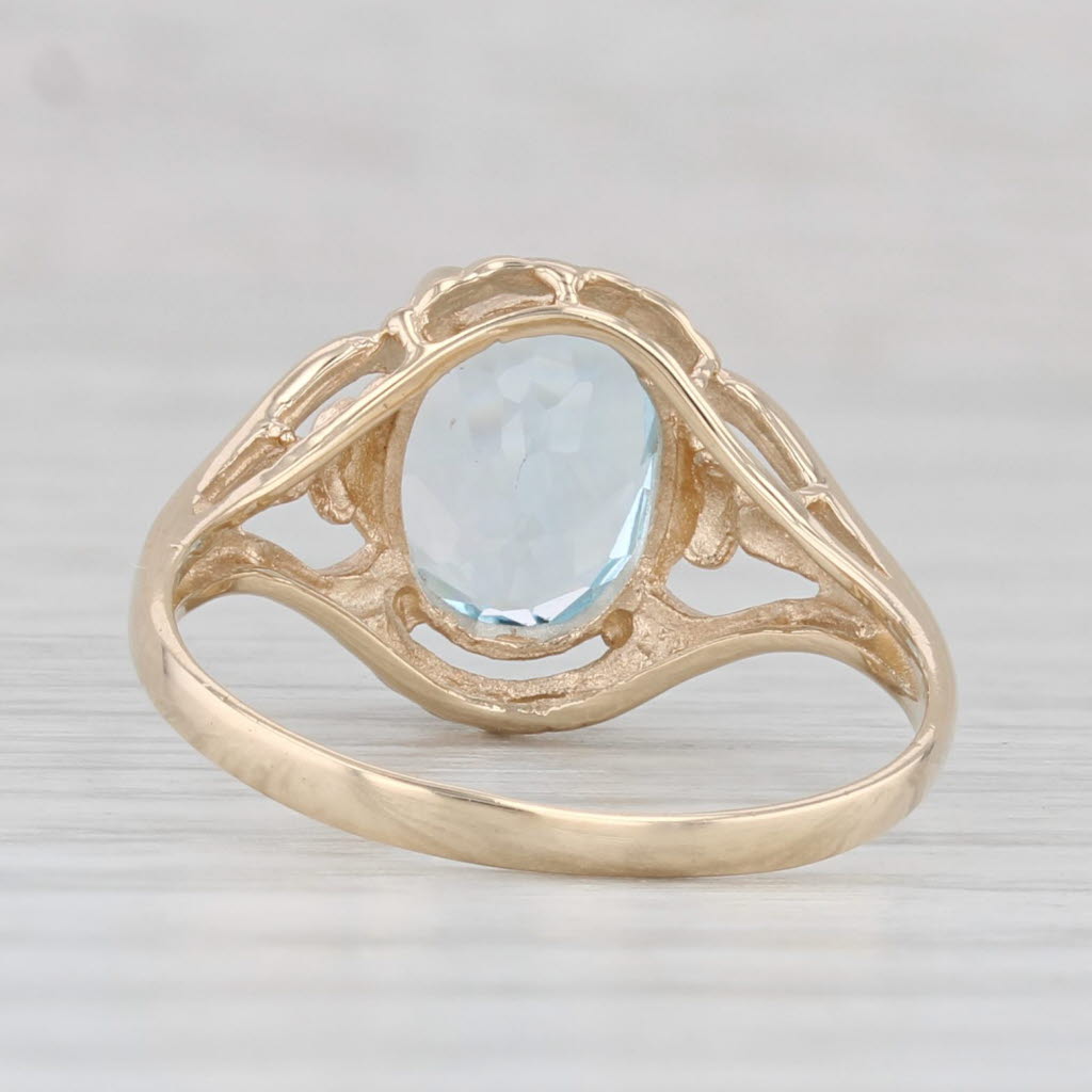 Light Gray 2.15ctw Oval Blue Topaz Solitaire Ring 10k Yellow Gold Size 6.5