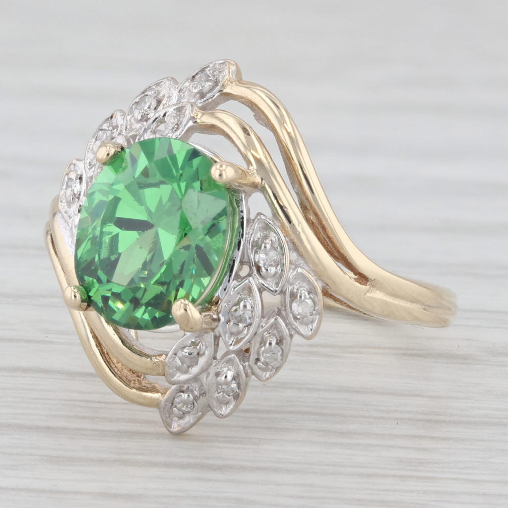 Light Gray 3.84ctw Green Cubic Zirconia Bypass Ring 10k Yellow Gold Size 6.5