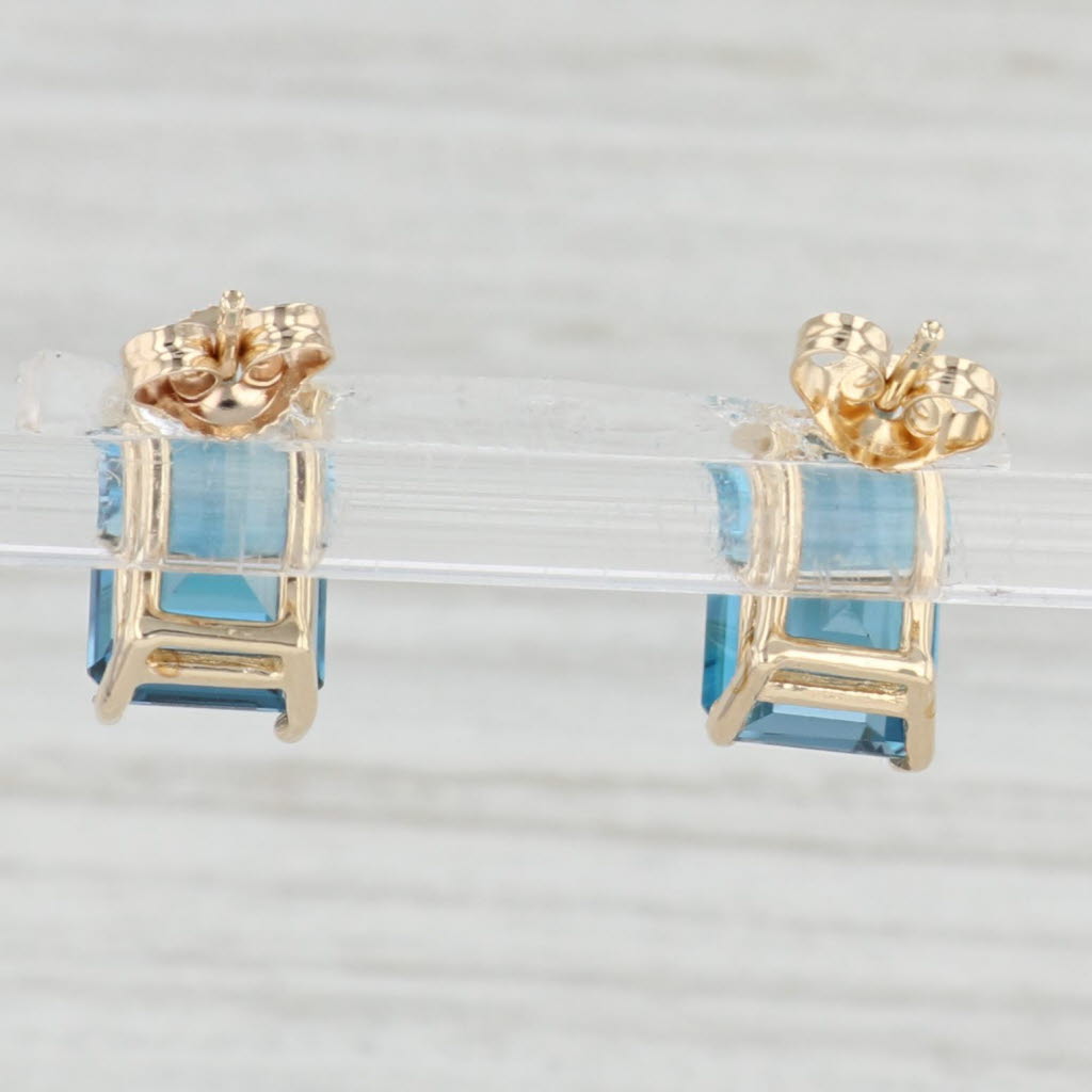 Light Gray 6ctw Emerald Cut London Blue Topaz Stud Earrings 14k Yellow Gold Solitaire Studs