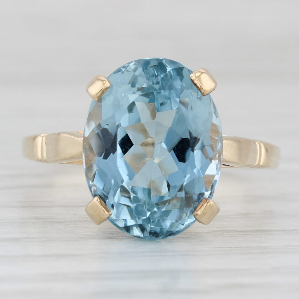 Light Gray 11.60ctw Oval Blue Topaz Solitaire Ring 10k Yellow Gold Size 9.5