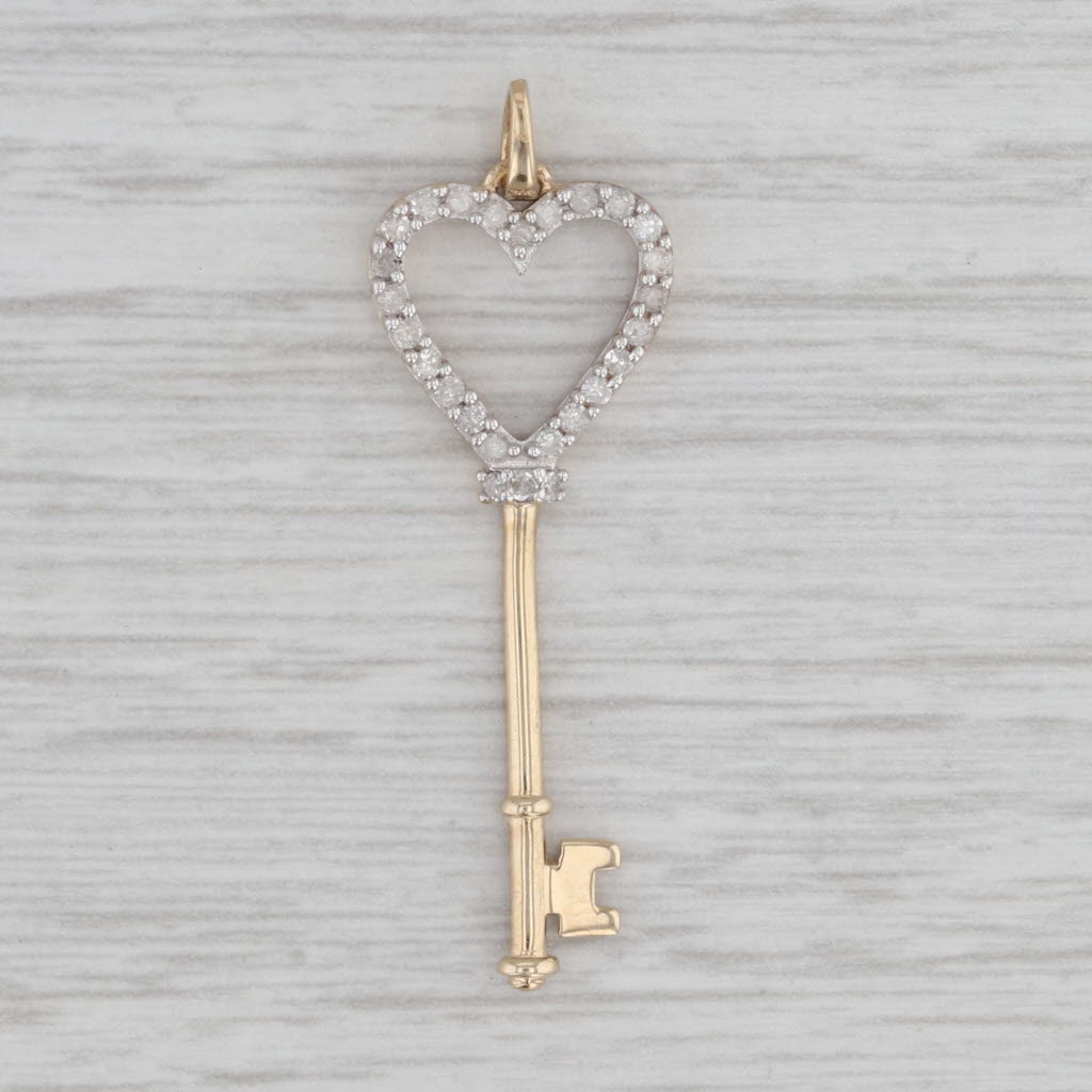 Gray 0.10ctw Diamond Heart Skeleton Key Pendant 10k Yellow Gold