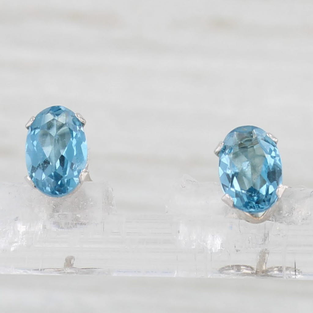 Light Gray 1.10ctw Blue Topaz Stud Earrings 14k White Gold Oval Solitaire Studs