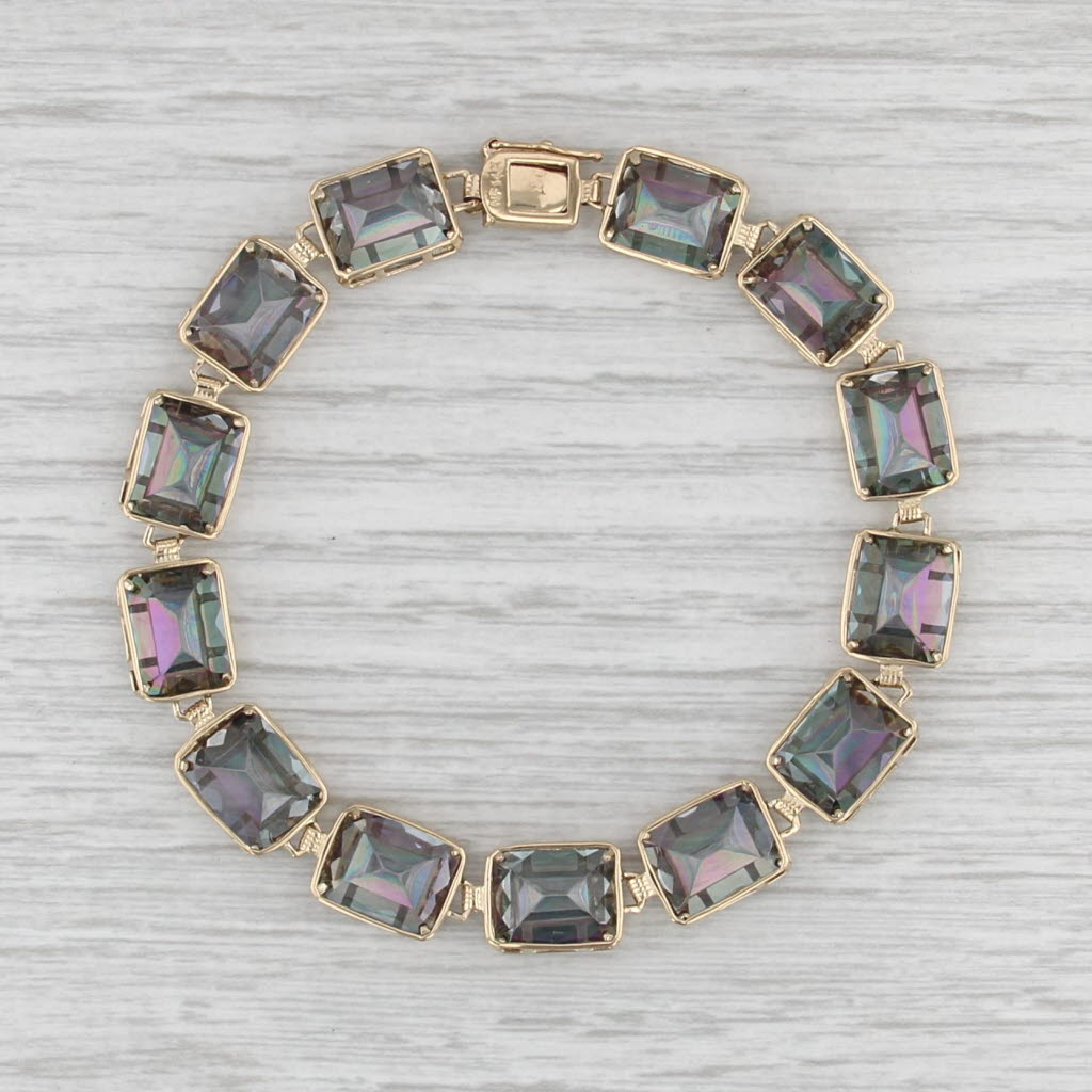 50ctw Mystic Topaz Tennis Bracelet 14k Yellow Gold 7.25" 9mm